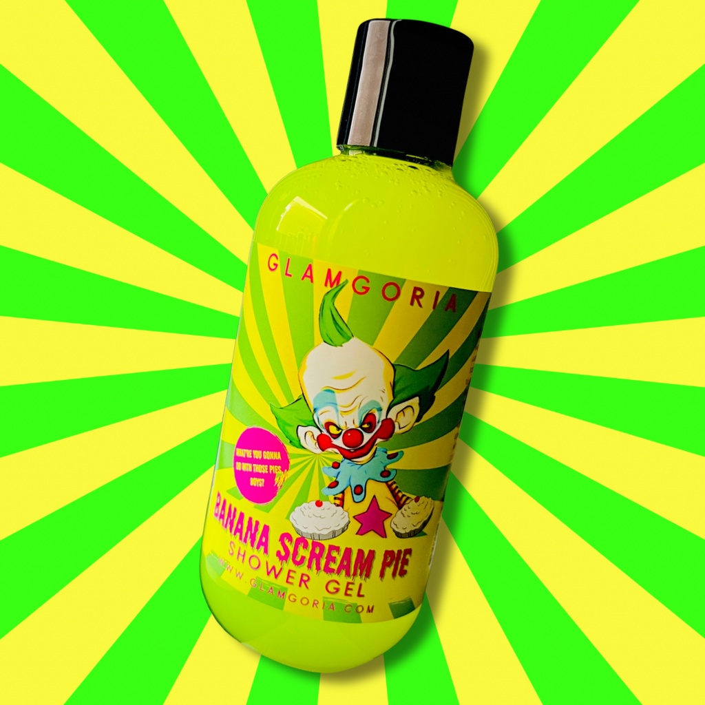 Bright neon yellow shower gel bottle with Killer Klowns-inspired clown label, featuring banana cream pie graphics.