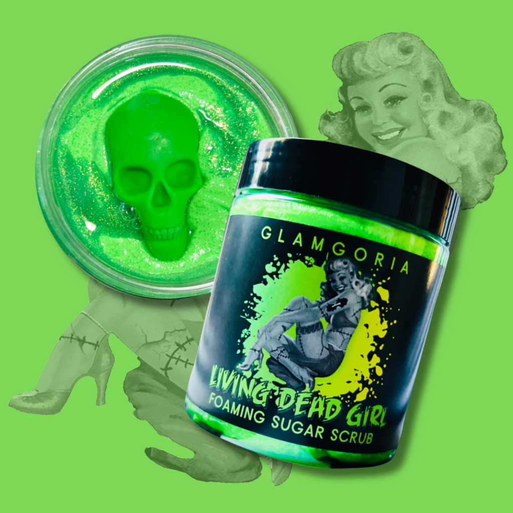 Living Dead Girl Foaming Sugar Scrub by Glamgoria, neon green with glitter and skull soap embed, pin-up zombie artwork on label