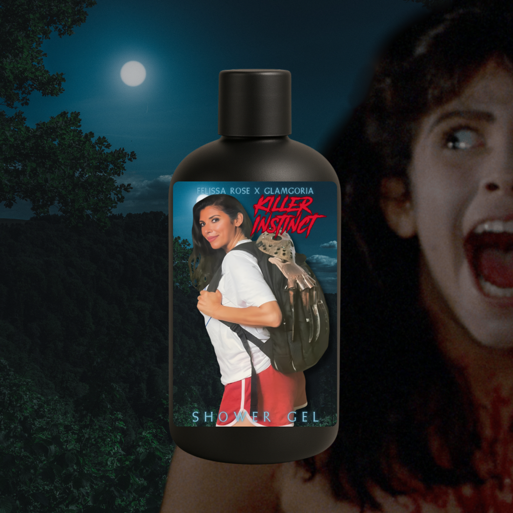 Matte black shower gel bottle labeled “Killer Instinct Shower Gel,” featuring Felissa Rose dressed in classic camp counselor style with a horror weapon backpack. Night forest and moonlit sky in the background.