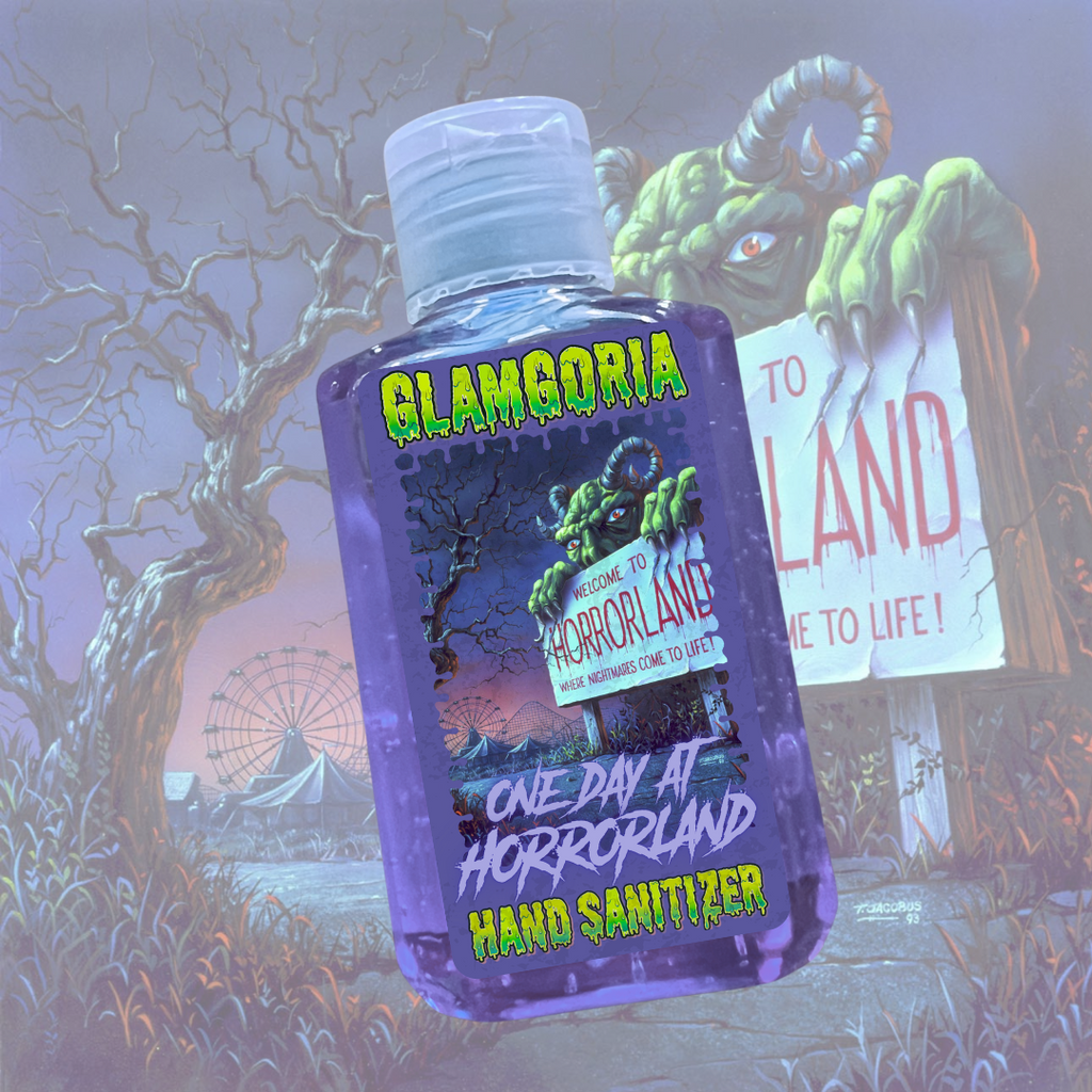 Purple Glamgoria hand sanitizer labeled “One Day at Horrorland,” featuring monster artwork and a creepy carnival sign.