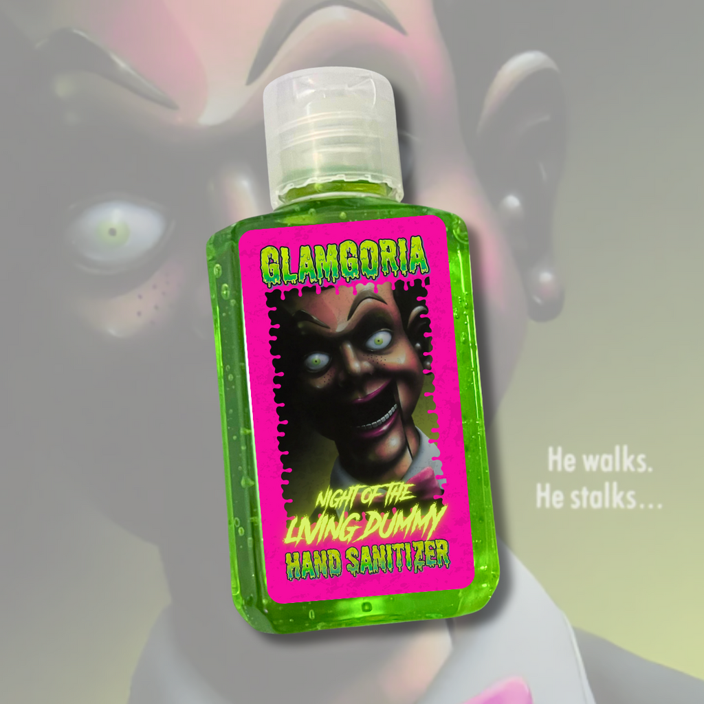 Green Glamgoria hand sanitizer labeled “Night of the Living Dummy,” featuring creepy ventriloquist dummy artwork.