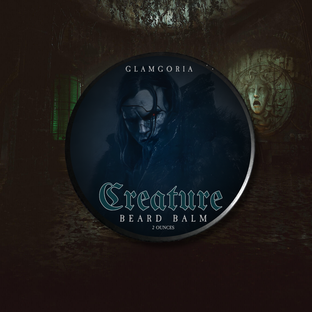 Creature body care products by Glamgoria with dark gothic labels, styled in a shadowy cathedral-like setting inspired by gothic monster romance.