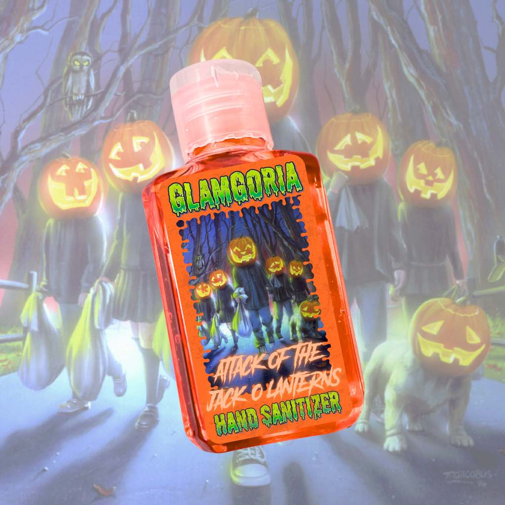 Orange Glamgoria hand sanitizer labeled “Attack of the Jack-O’-Lanterns,” inspired by Goosebumps, glowing with jack-o’-lantern art.