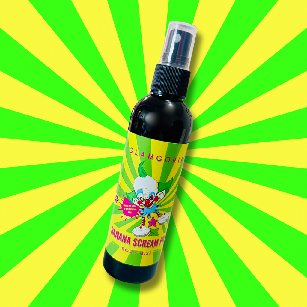 Banana Scream Pie body spray bottle with a creepy-cute clown and banana pie art on a bright circus-style background.