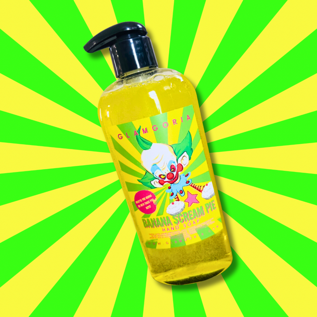 Neon yellow hand soap bottle labeled Banana Scream Pie with clown imagery and banana pie design.