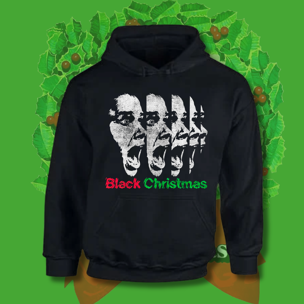 Black pullover hoodie with distressed repeating scream face graphic and red and green “Black Christmas” text inspired by the 1974 slasher film.