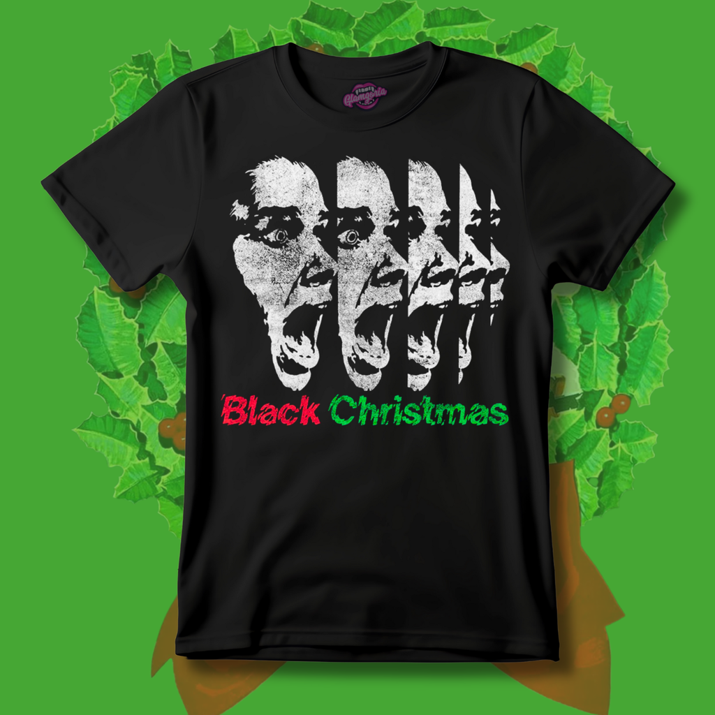 Black t-shirt featuring a distressed repeating scream face graphic with red and green “Black Christmas” text inspired by the 1974 horror film.