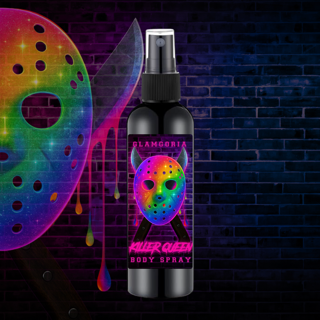 A black bottle of Glamgoria’s Killer Queen body spray with a rainbow-sparkled hockey mask and crossed knives on the label. The background features a dark brick wall with neon blood drips and glowing rainbow elements, evoking a glam horror club vibe.
