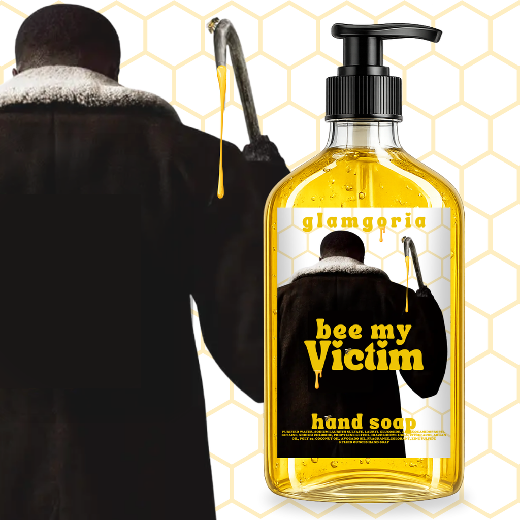 hand soap bottle filled with golden yellow soap labeled “Bee My Victim” with honeycomb background and horror-inspired artwork