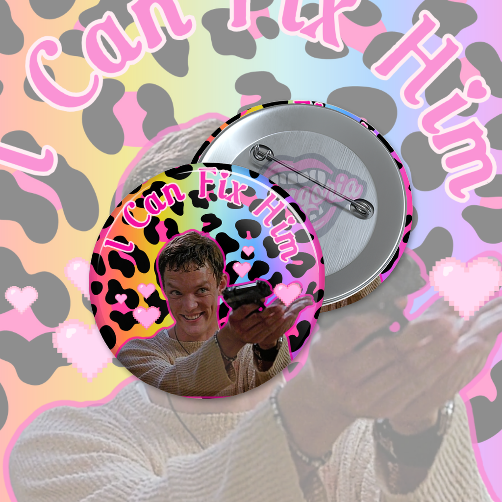 Round pinback button with pastel rainbow leopard background and pink hearts, featuring a slasher-inspired character with bloodied hands and the text “I Can Fix Him.”

