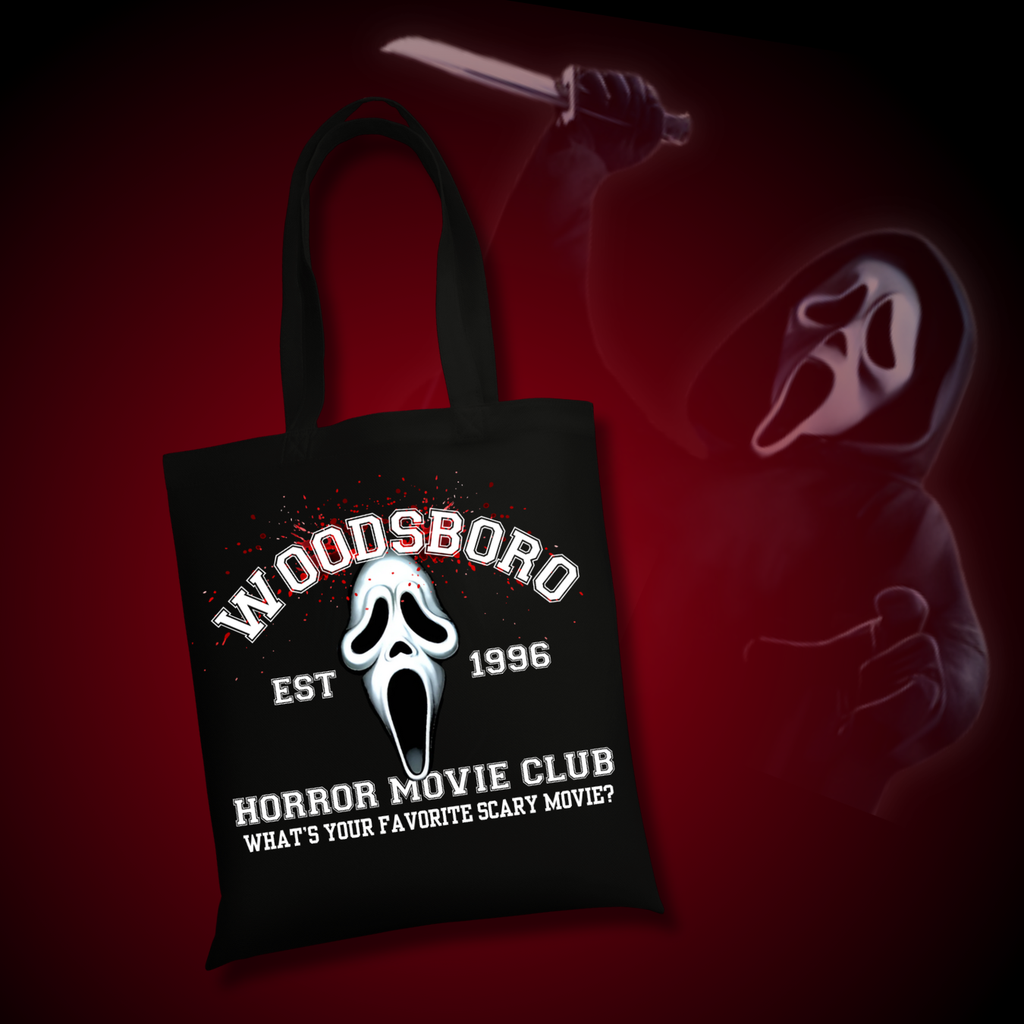 Black tote bag with “Woodsboro Horror Movie Club EST 1996” and ghostface-inspired design with the phrase “What’s your favorite scary movie?”