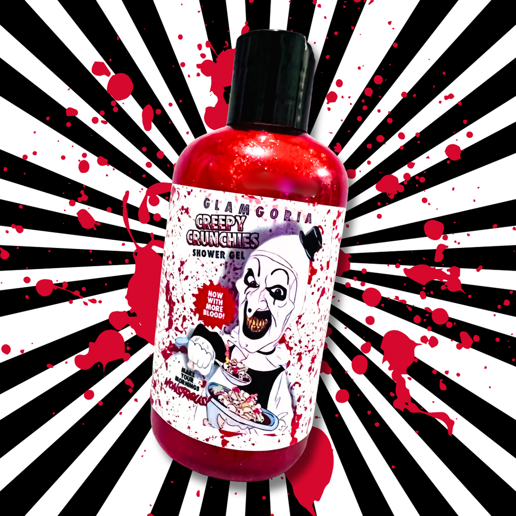 Bottle of Glamgoria’s Creepy Crunchies Shower Gel featuring Art the Clown-inspired design, against a black and white striped background splattered with red blood effects.