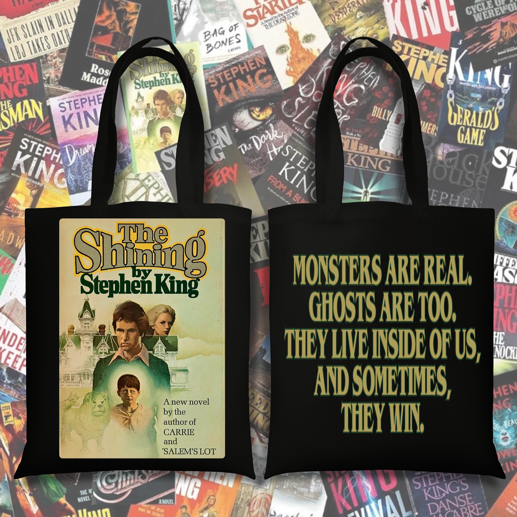 Black tote featuring The Shining inspired book cover on one side and the quote “Monsters are real. Ghosts are too.” on the other.
