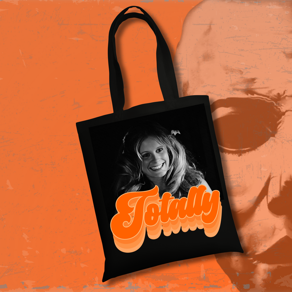 Black tote bag with “Totally” retro-inspired horror design.