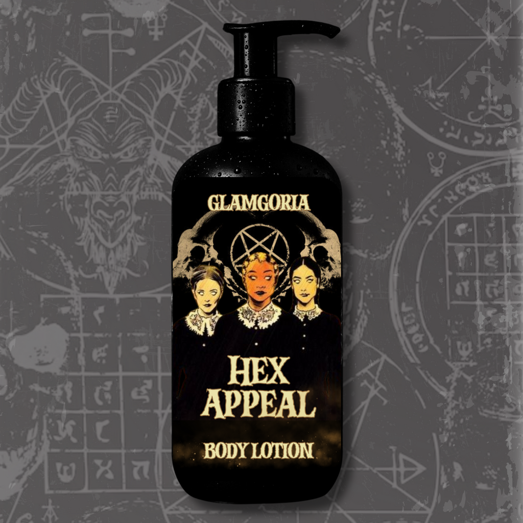 A matte black pump bottle labeled Hex Appeal Body Lotion by Glamgoria, with gothic witch artwork of three women beneath a pentagram.