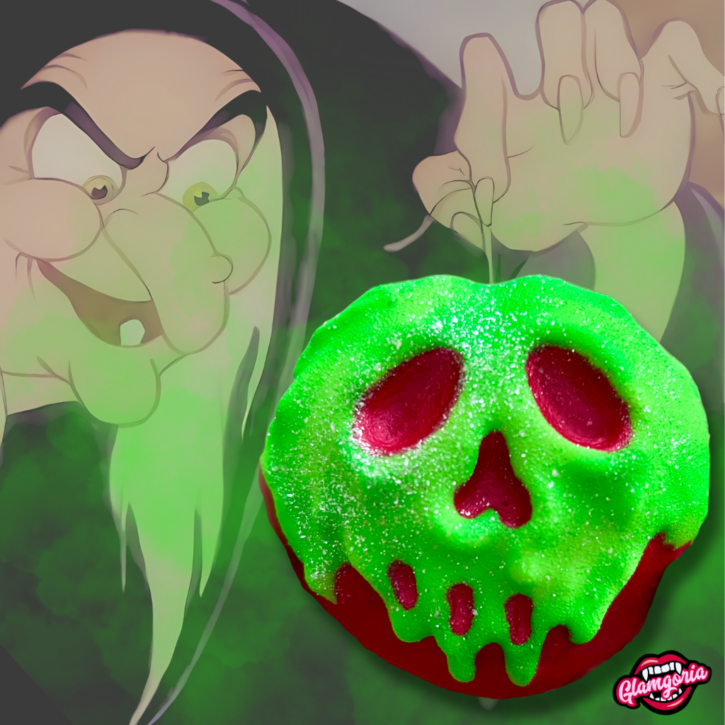 A close-up image of a Poison Apple bath bomb, shaped like an apple with a red base and a green top that drips down like poison, forming a skull face on the surface. The bath bomb is sprinkled with fine glitter, giving it a shimmering effect. Behind the bath bomb is an illustration of the Evil Queen as the old hag, holding the poisoned apple, emphasizing the sinister and magical allure of the product.