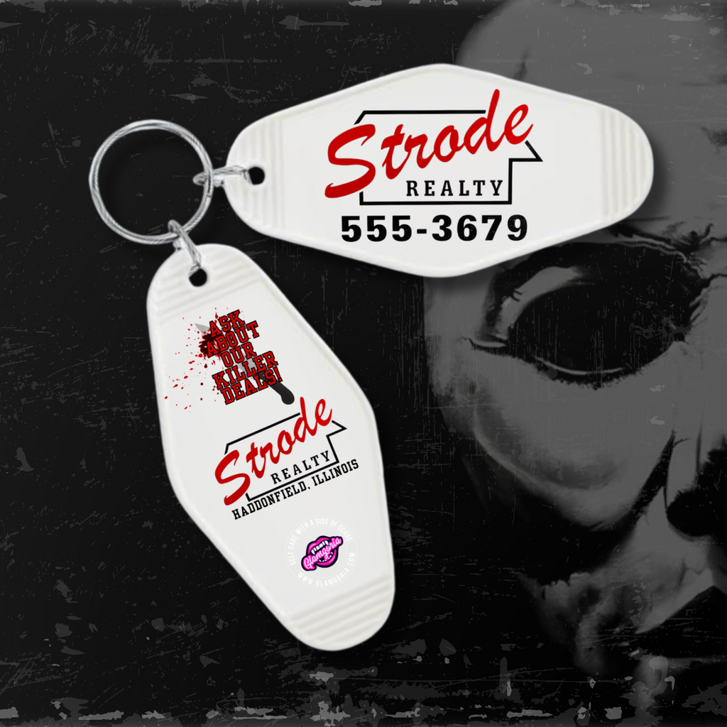 retro motel-style keychain with “Strode Realty” design.