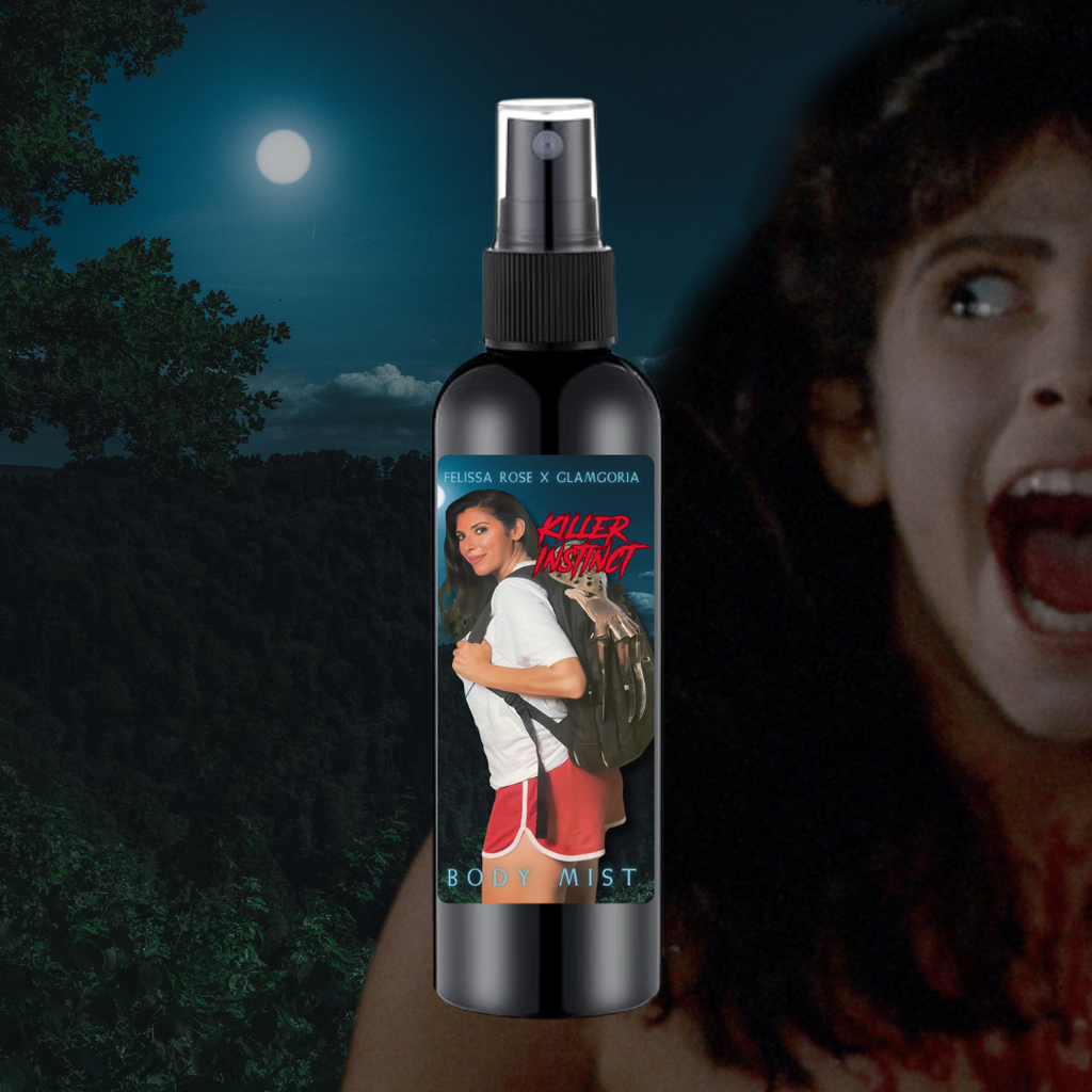 “Black body mist bottle with horror-themed label featuring Felissa Rose in retro camp counselor attire, promoting Killer Instinct fragrance inspired by Sleepaway Camp.”