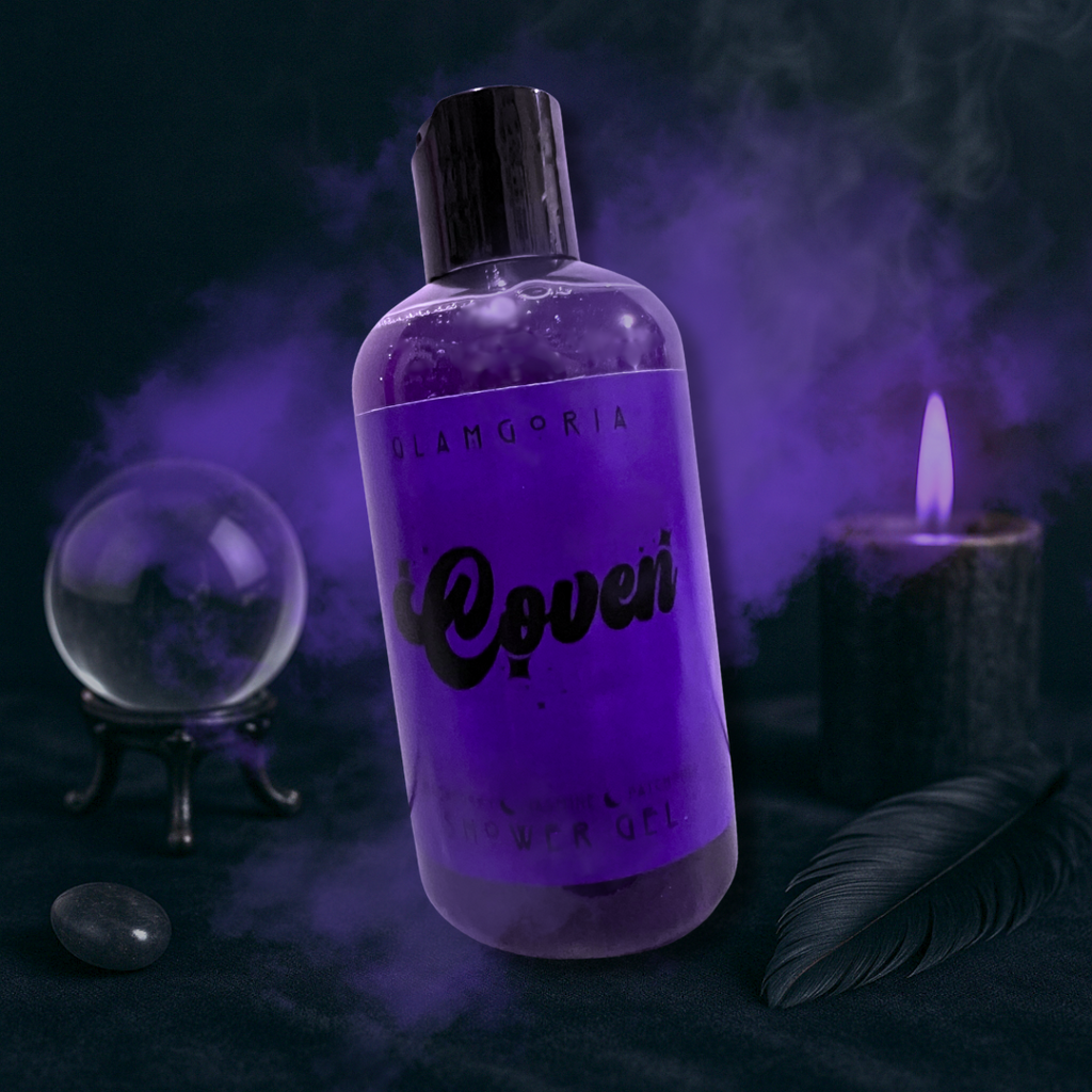 Coven Collection shower gel on a witchy altar with candle, feather, and crystal ball.